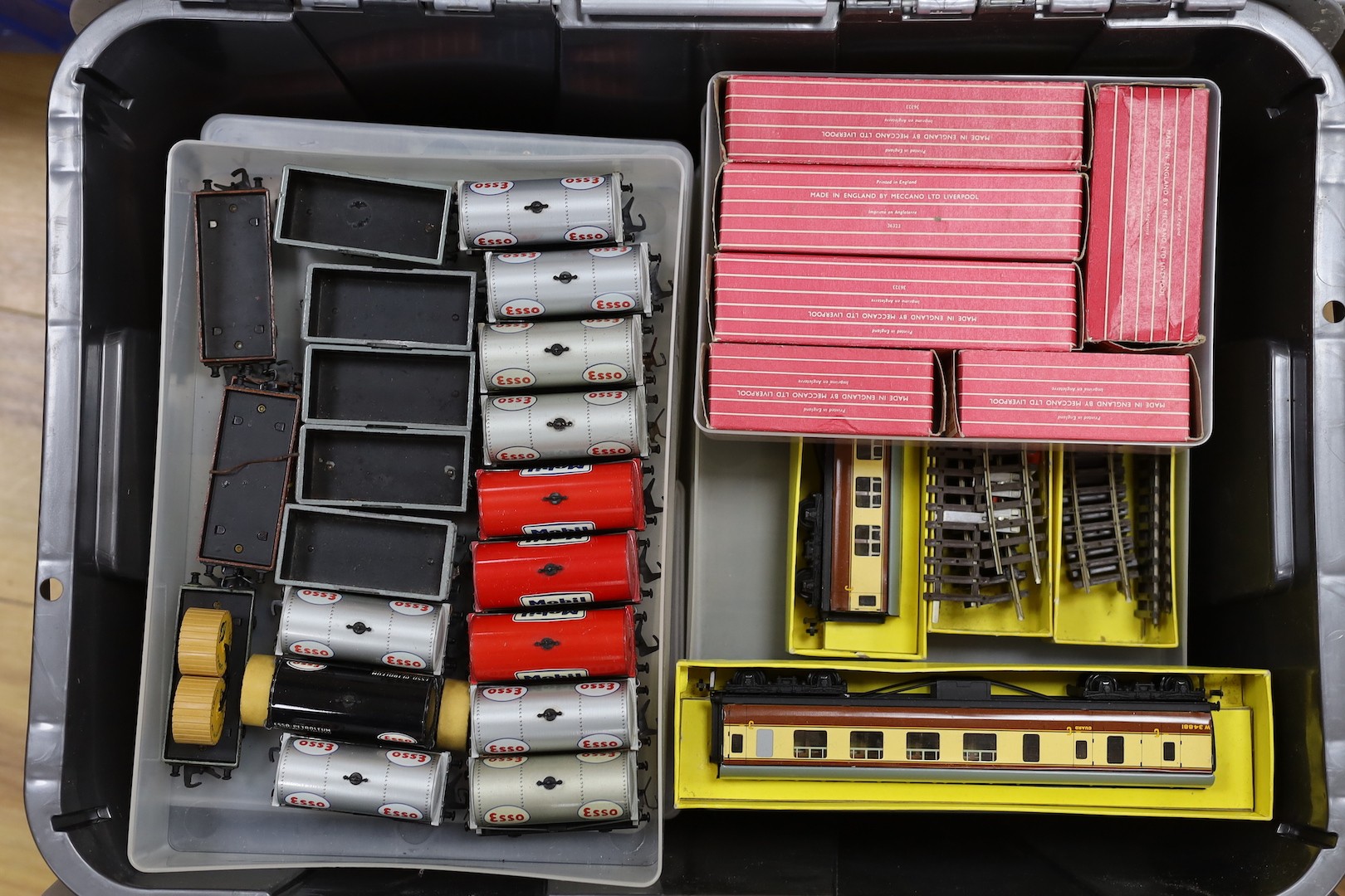 A large quantity of Hornby Dublo carriages, wagons and other rolling stock, much with original boxes, much unboxed, spare boxes which may well match, 5 boxes